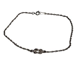 3 for $25 ❤ Avon silvertone rope knot bracelet